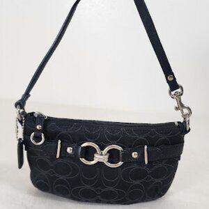 Coach Pochette. Ability to extend strap.